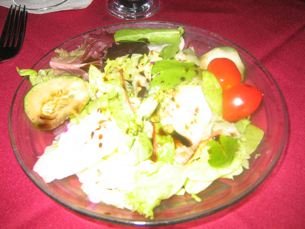 Mixed green salad with oil and balsamic vinegar