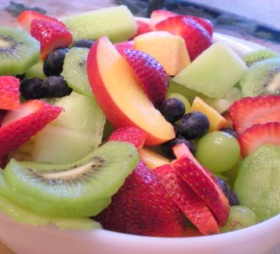A Fruit Bowl to share: Honeydew Melon, Peach, White Grapes, Kiwi, Blueberries, and Strawberries