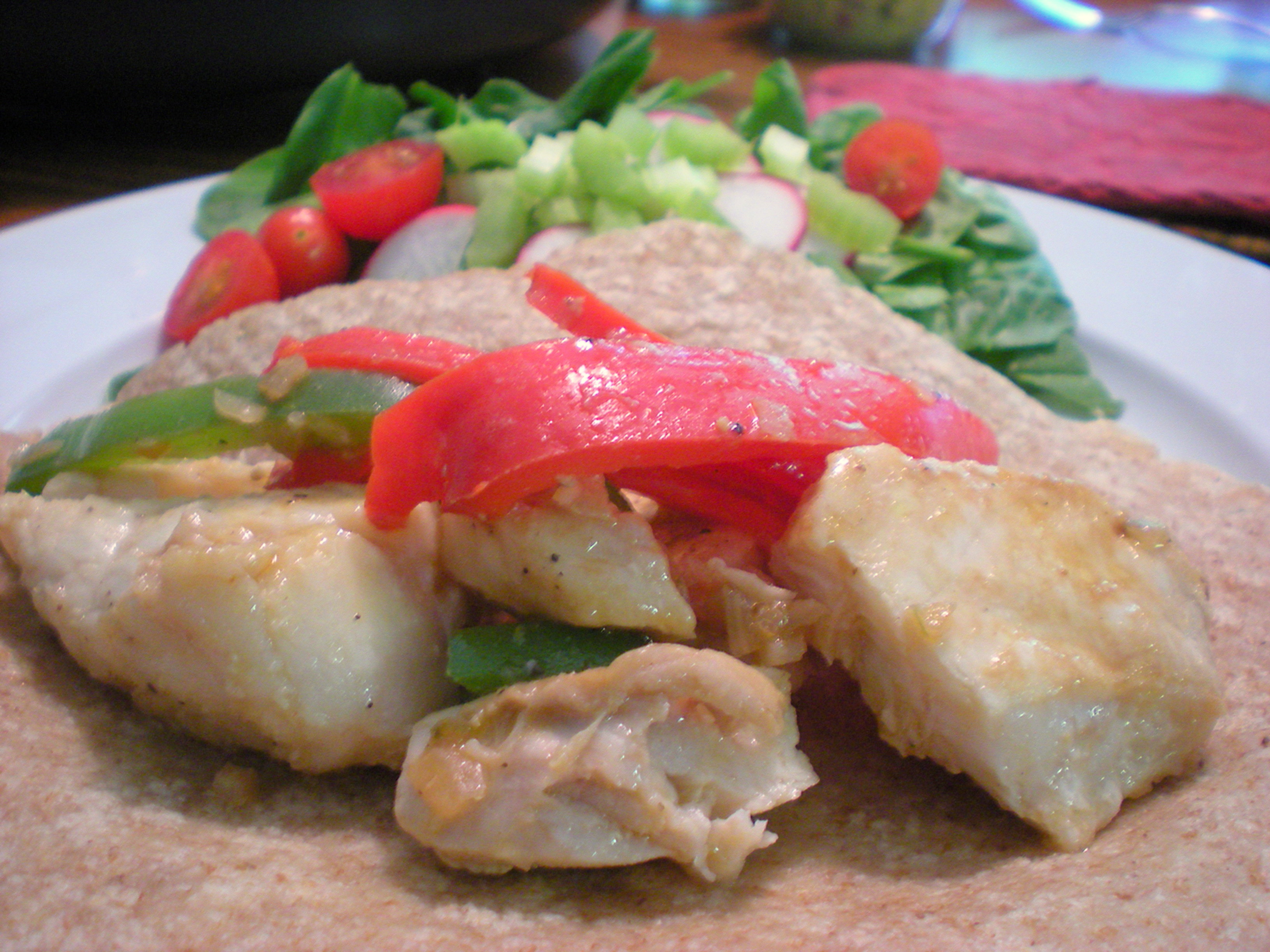 Place the fish and peppers on the wrap