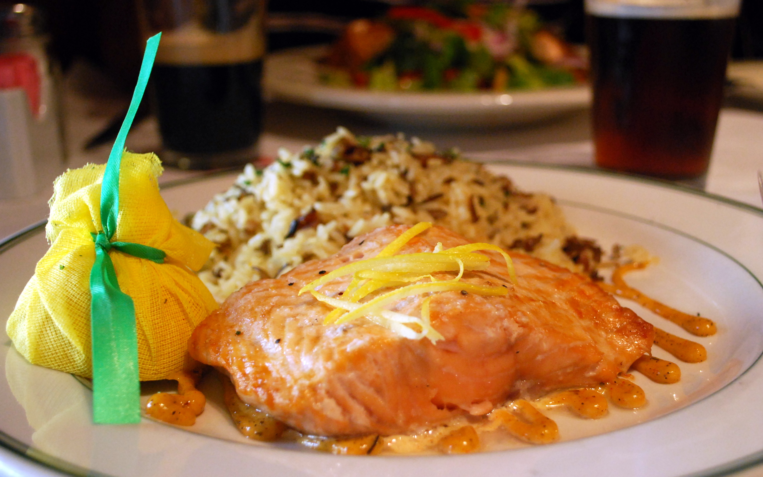 My salmon was oven baked sitting on a hint of lemon cream served with rice pilaf