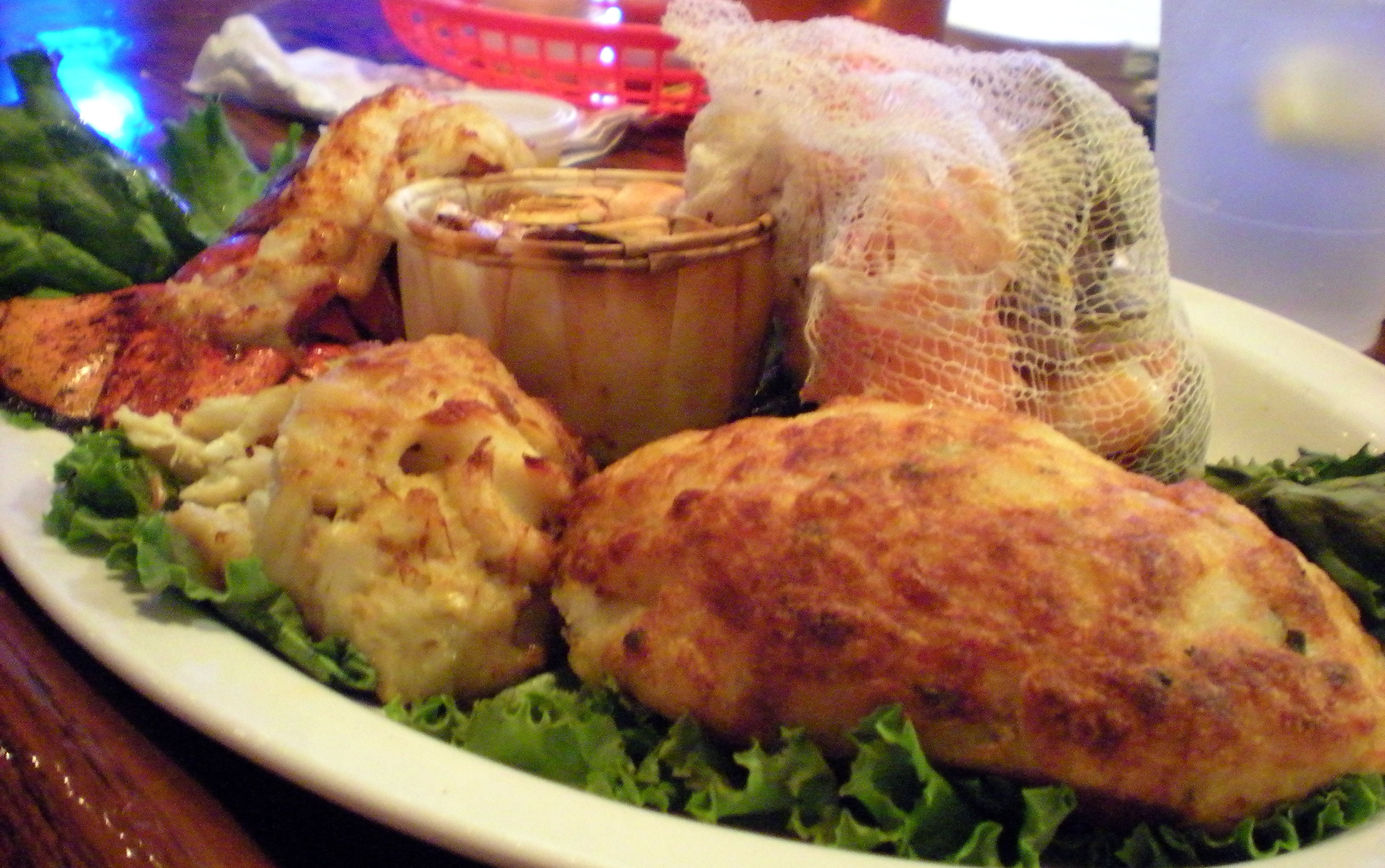 Ted: Net Catch which included a twice baked potato, lobster tail, rock fish, crab imperial with shrimp, crab cake, steamed crab-shrimp-little necks for $29.00