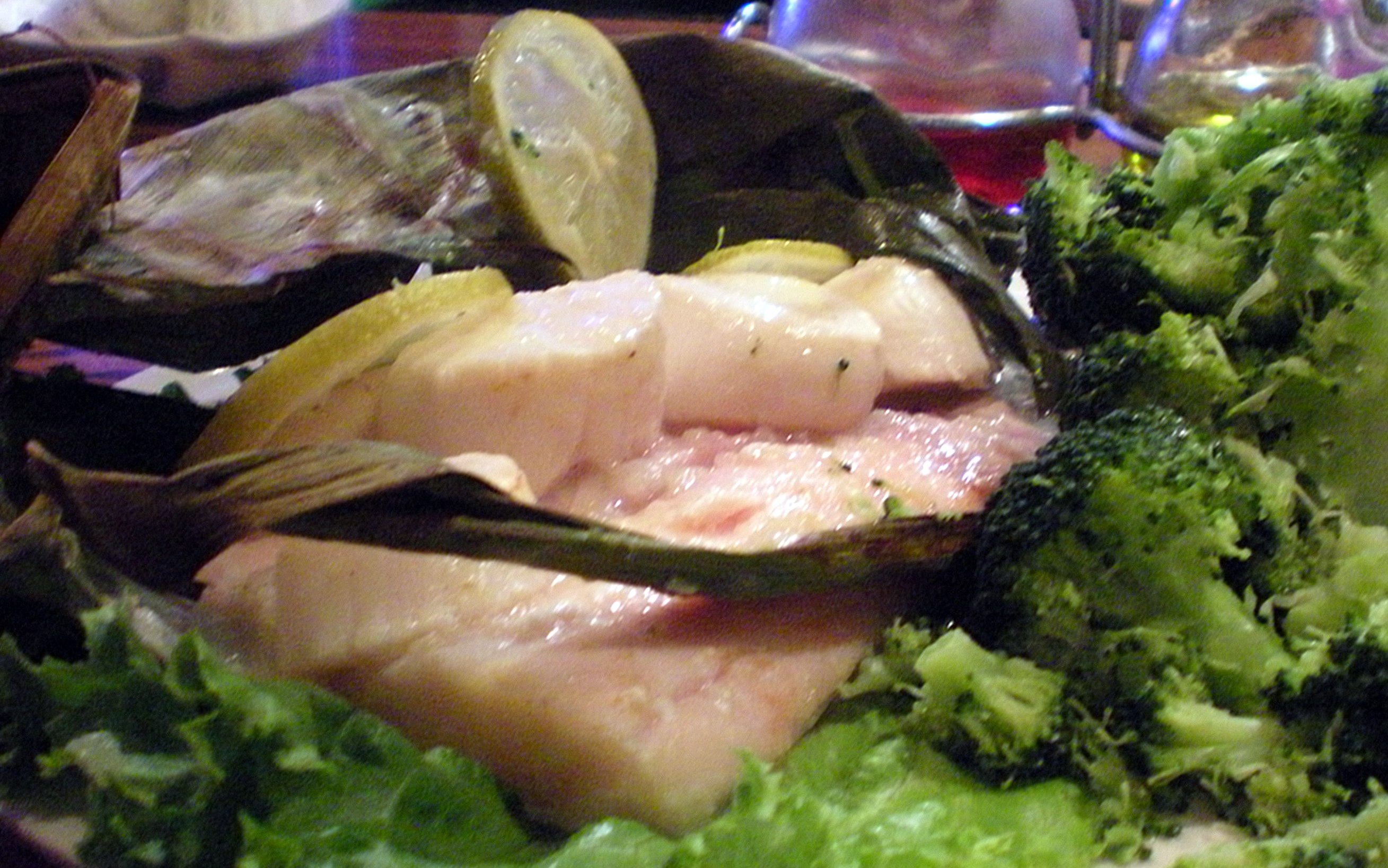Joanne: Grouper and Scallops Mojito wrapped in a banana leaf broiled in lime and mint sauce $21.99
