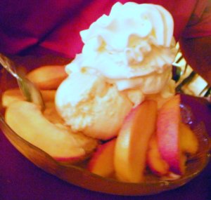 Peach Shortcake with heaps of icecream and whipped cream.  All for Ted.